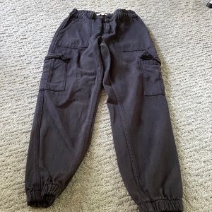 PacSun, black denim jeans w/ side pockets & gathered at ankle, size s.